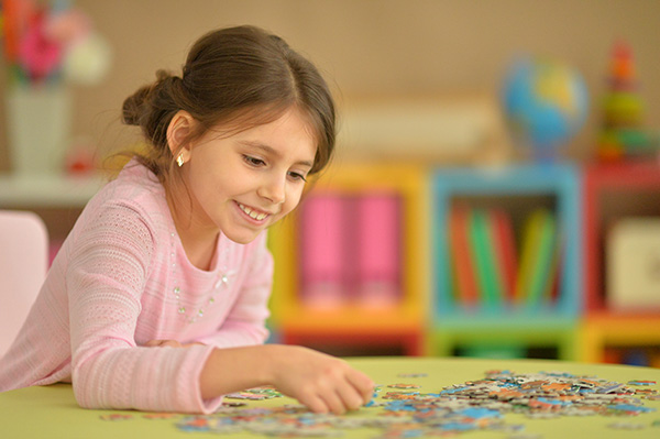 girl-working-puzzle